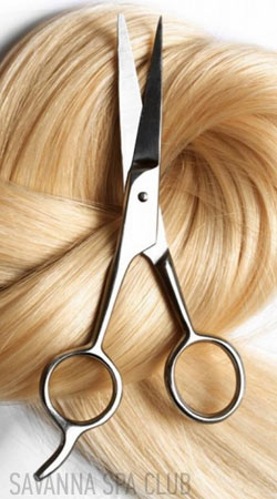 волосся і ножниці - символ жіночої стрижки